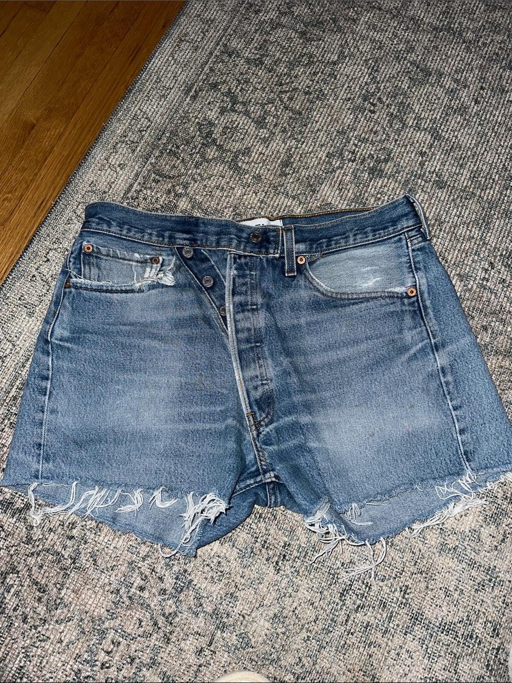 EB Denim Distressed Asymmetrical Criss Cross Cutoff Jean Shorts